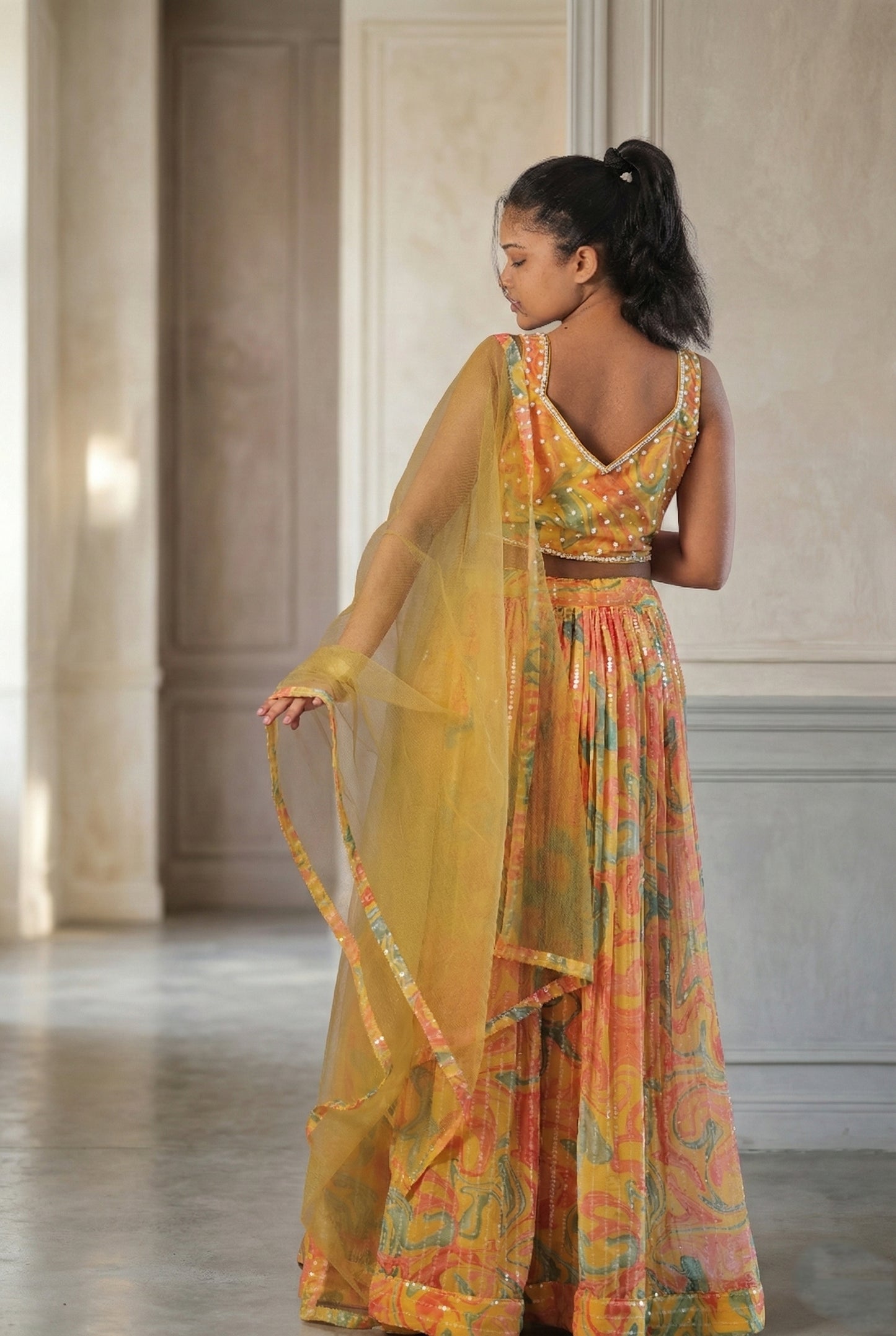 Raqs-e-Noor - Yellow Sequin Lehenga Set